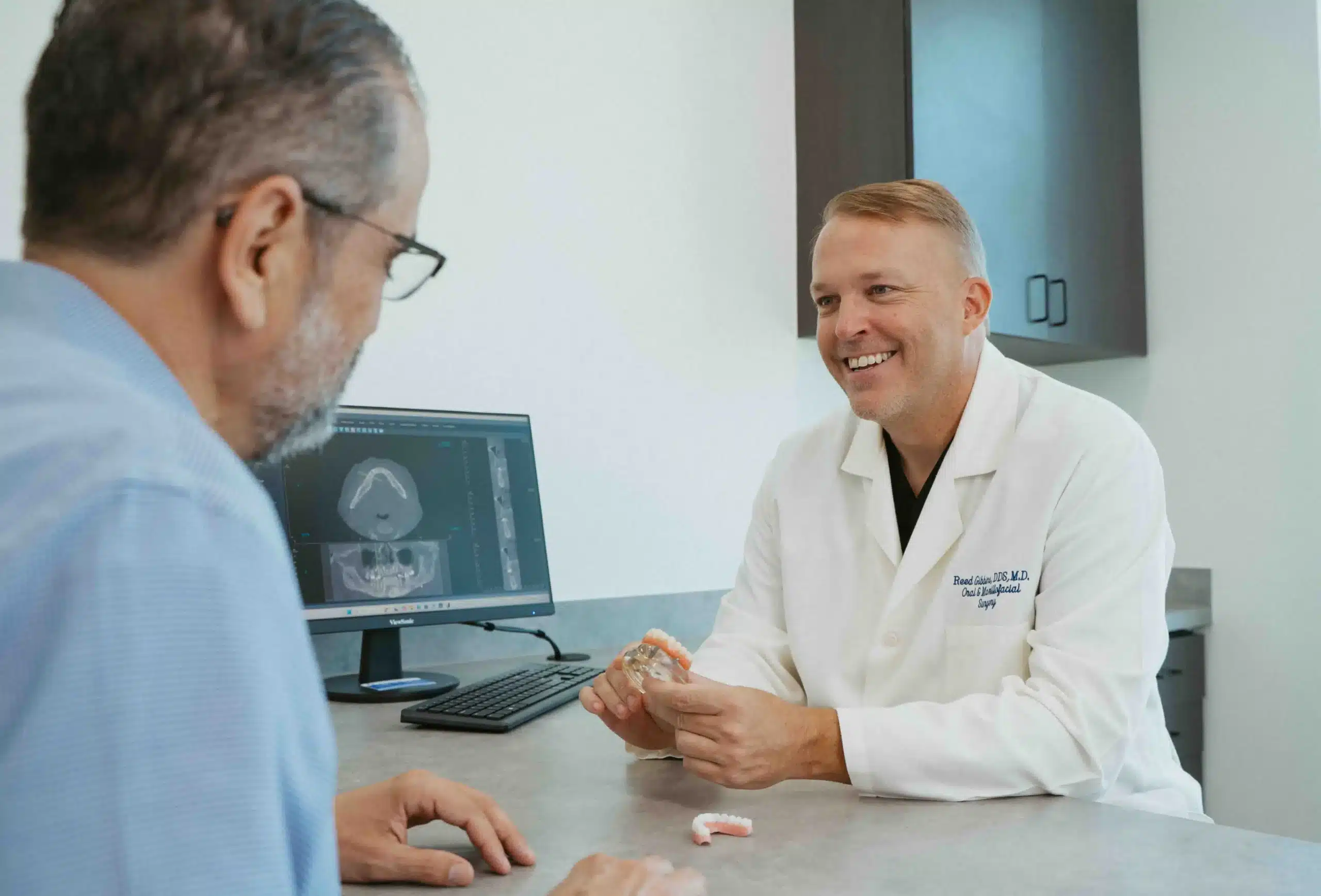 Dr. Gibbins explaining diagnosis to patient