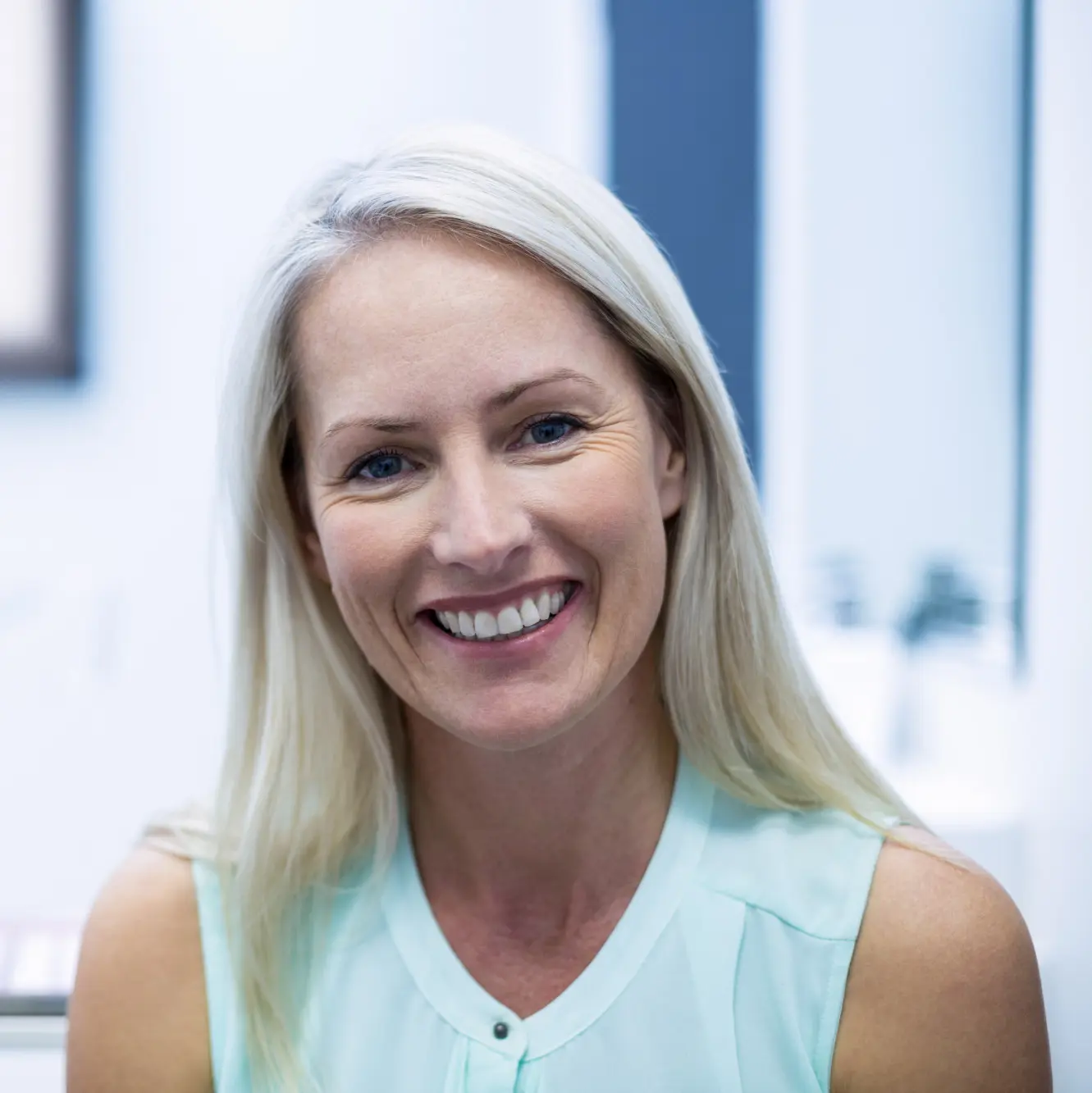 Elderly woman with a radiant smile, expressing satisfaction after a consultation with our Forney dentist regarding dental implants for seniors. data-lazy-srcset=